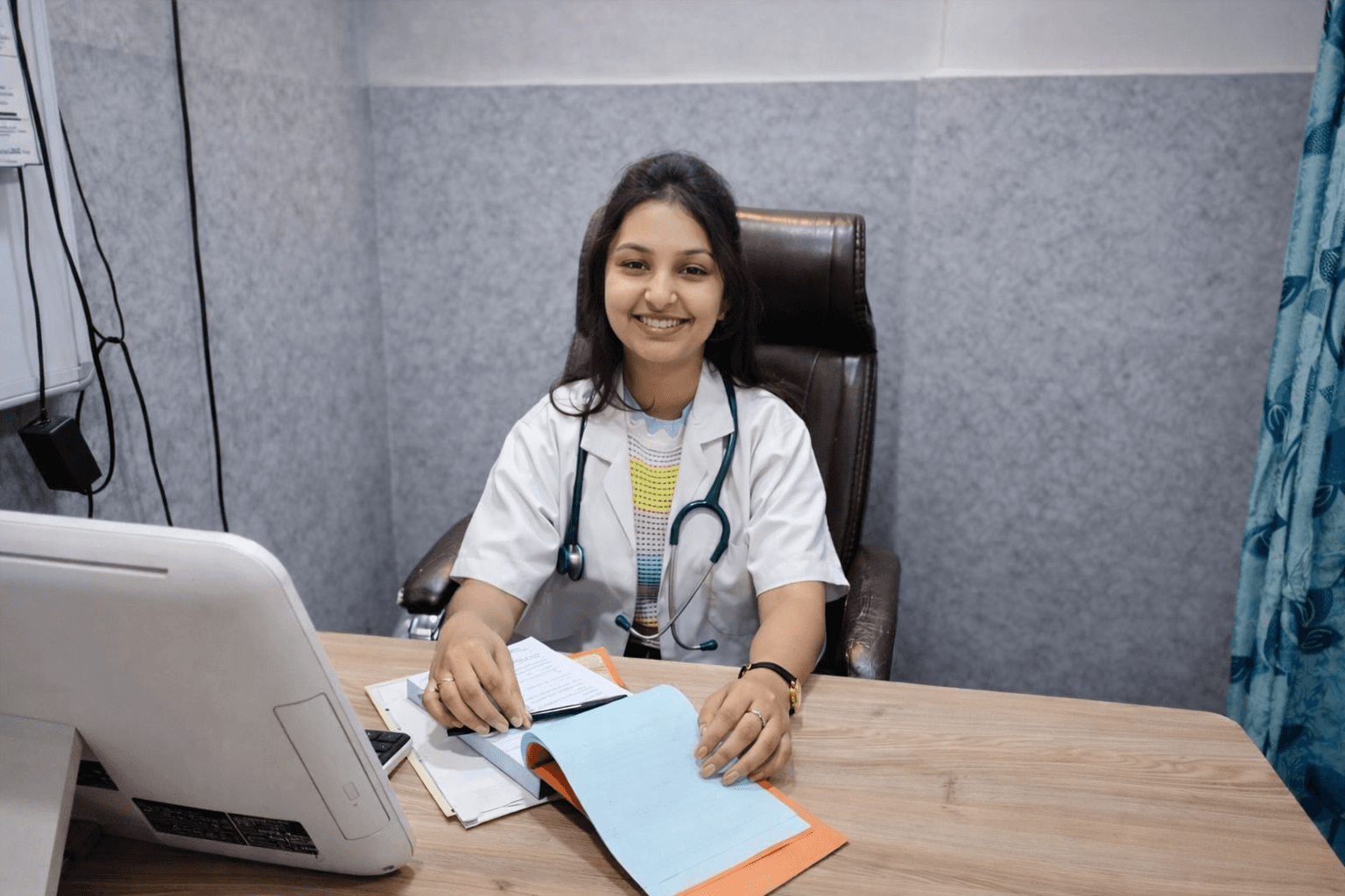 Dr. Pratima Agale consulting a patient